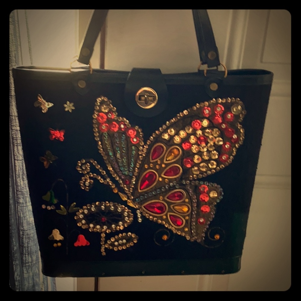 Beautiful black jeweled handbag.